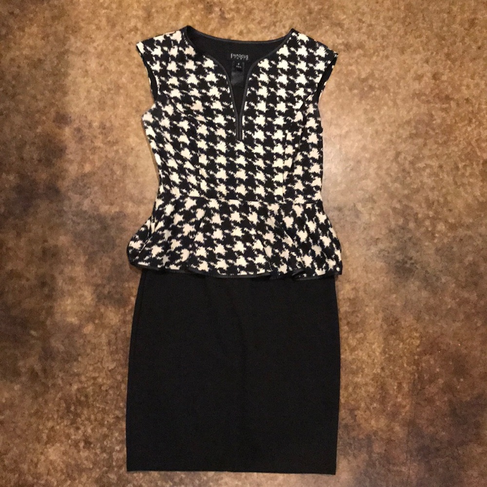 Back and cream Peplum dress.